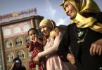 Xinjiang city bans Islamic dress