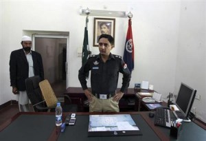 Pakistani police superintendent Sohail Zafar Chattha is seen at his office in Rahim Yar Khan in the eastern Punjab Province March 2, 2013. REUTERS/Faisal Mahmood