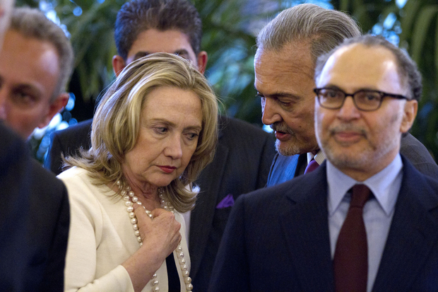 US Secretary of State Hillary Rodham Clinton (L) speaks with Saudi Arabia's Foreign Minister Saoud Al-Faysal Bin Abdelaziz Al Saoud during a meeting on Syria at the French foreign ministry in Paris, on April 19, 2012. Syria and the United Nations signed a deal Thursday on the framework for observers monitoring a shaky ceasefire, as Arab and Western ministers gathered in Paris. AFP PHOTO/POOL/Jacquelyn Martin / AFP PHOTO / POOL / JACQUELYN MARTIN