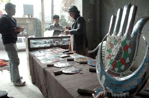 QUETTA, PAKISTAN, NOV 28: A shopkeeper sells Azadari Items for Muharram-ul-Haram at his shop at Alamdar road in Quetta on Monday, November 28, 2011. (Arsalan Naseer/PPI Images).